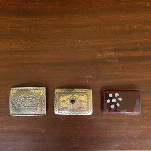 Lot of 3 belt buckles, 2 silver, 1 glass